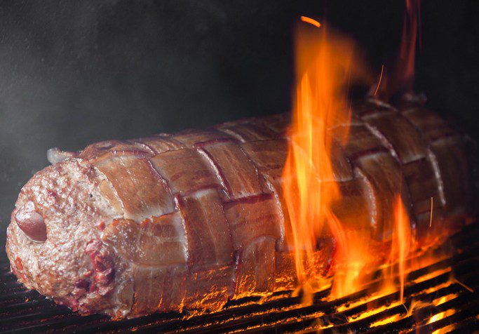 A hunk of meat: The fatty at burn co. bbq consists of layers of sausage wrapped in bacon, perfectly grilled together.