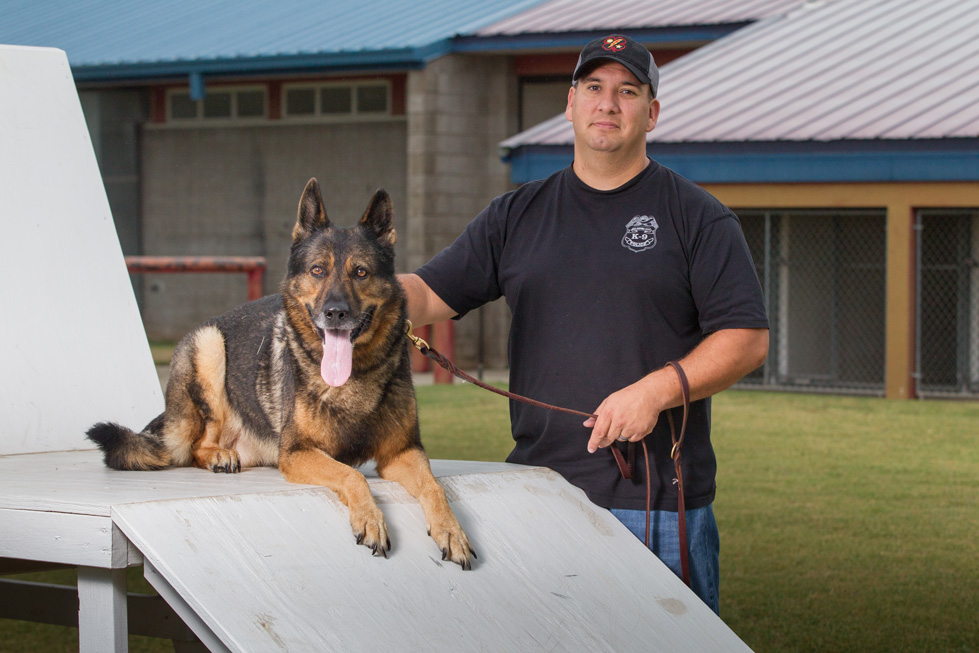 Dan Evans (right) and retired k-9 officer rocky turned a work relationship into a lasting friendship. Photo by Brent Fuchs.