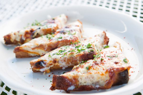 Cheesy crab toasts are a classic starter at R&J Lounge and Supper Club. Below: Smoky Mac & Cheese. Photos by Brent Fuchs.