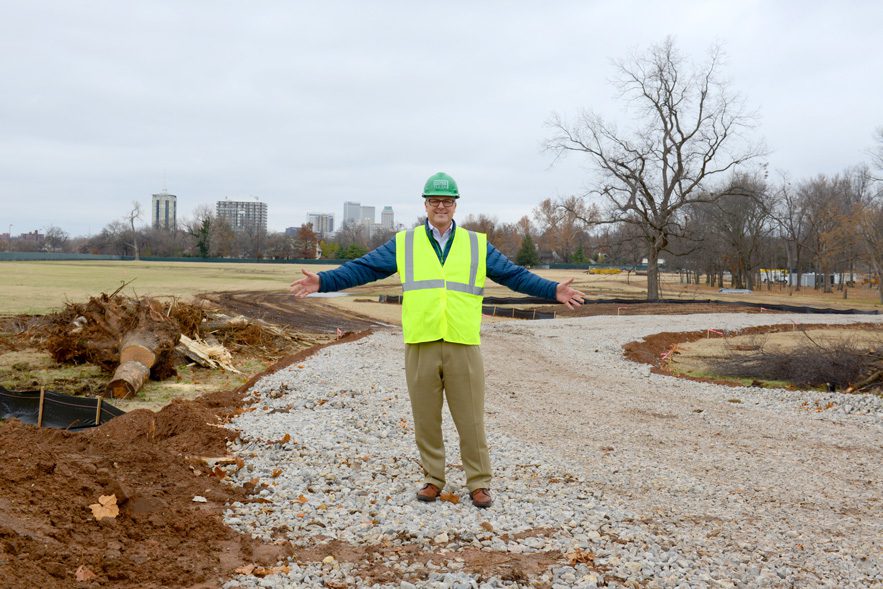 Jeff Stava, executive director of Tulsa’s Gathering Place, Llc, stands on land near riverside drive that eventually will be transformed into a gathering place.  Photo by Natalie Green.