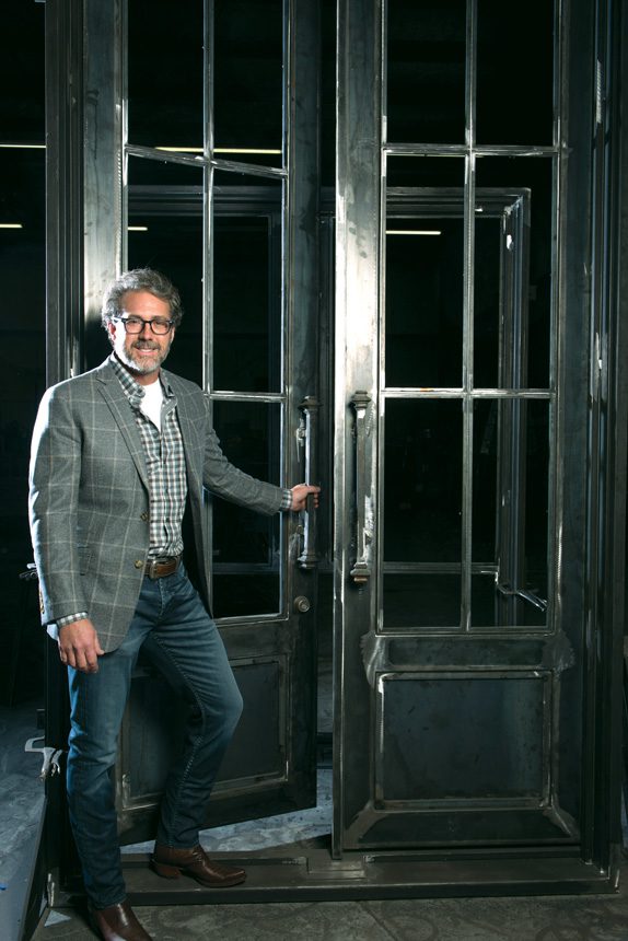 Designer Rob Key crafts doors, stair railings, balconies and gates from iron. Photos by Nathan Harmon.