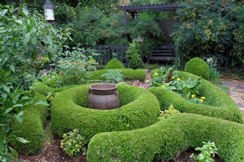 Linda Vater’s garden, 20 years in the making, features boxwoods, mature trees and a potager. Photo by David Cobb.