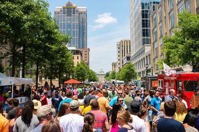 Crowds enjoy food trucks and fun along the happening Fayetteville street.