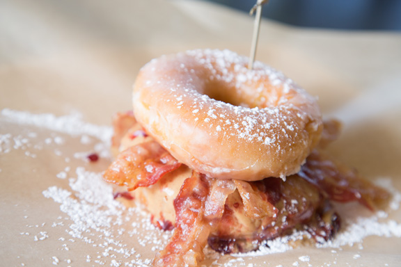 The Donut Touch My Nuts features peanut butter, jelly and bacon, sandwiched between two Krispy Kreme doughnuts. Photo by Brent Fuchs.