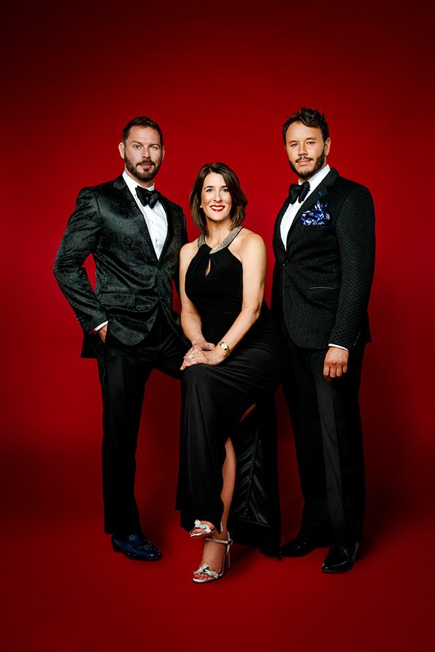 Red Ribbon Gala 2016 co-chairs Jay Krottinger (left) and Ryan Tanner with honoree Patricia Chernicky. Photo by Tony Li.