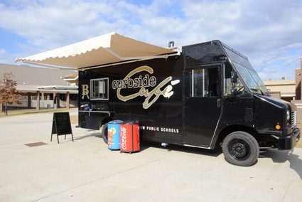 Curbside Cafe’s truck provides food options for broken arrow students. Photo by Natalie Green.