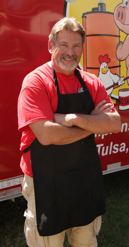Tulsa Attorney Brad Beasley competes in 25 to 30 barbecue competitions each year. Photo by Marc Rains.