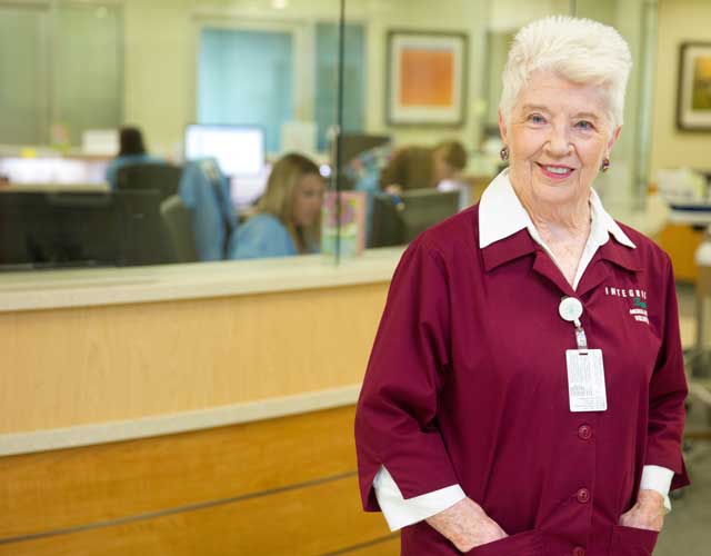 Jackie Bray of Oklahoma City considers her day of volunteering at Integris the highlight of her week, apart from church on Sunday. Photo by Brent Fuchs