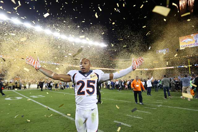 Harris on the field after defeating the Carolina Panthers in the Super Bowl. Photo by Eric Lars Bakke.
