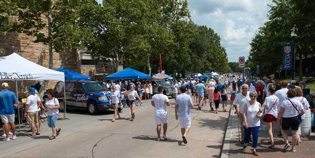 Hundreds of university of Tulsa fans flood the streets of campus before a big game. Photo by Brett Rojo, courtesy The University of Tulsa.