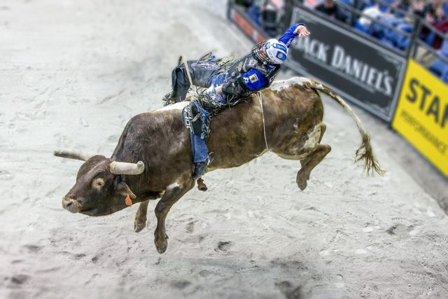 Ryan Dirteater rides during the championship round of the PBR BFTS Chicago Invitational.