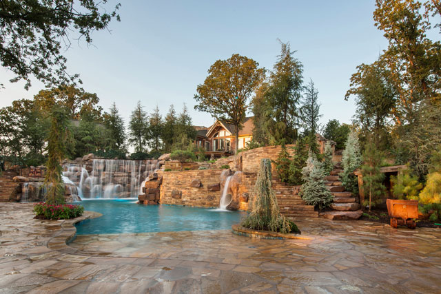 Kelly Caviness of Caviness Landscape Design says waterfalls are both attractive and therapeutic. Photo by KO Rinearson.
