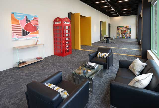  London-style British red phone booth is a clever conversation piece in the TPC reception area. “It was a prop from a fund-raising event we planned and we decided to give it a home in this area,” Todd remarked. 