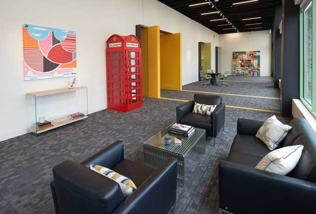 London-style British red phone booth is a clever conversation piece in the TPC reception area. “It was a prop from a fund-raising event we planned and we decided to give it a home in this area,” Todd remarked.
