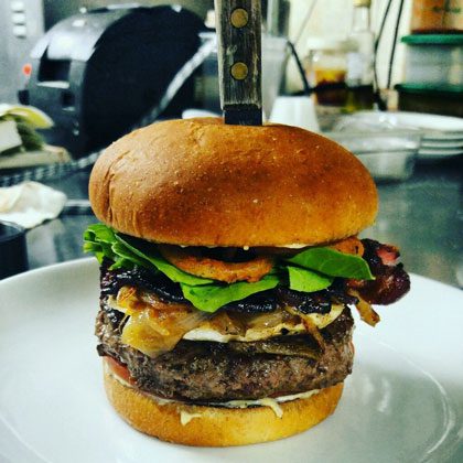 The St. Alexander the Specht burger is popular at saints. Photo courtesy Saints Pub.