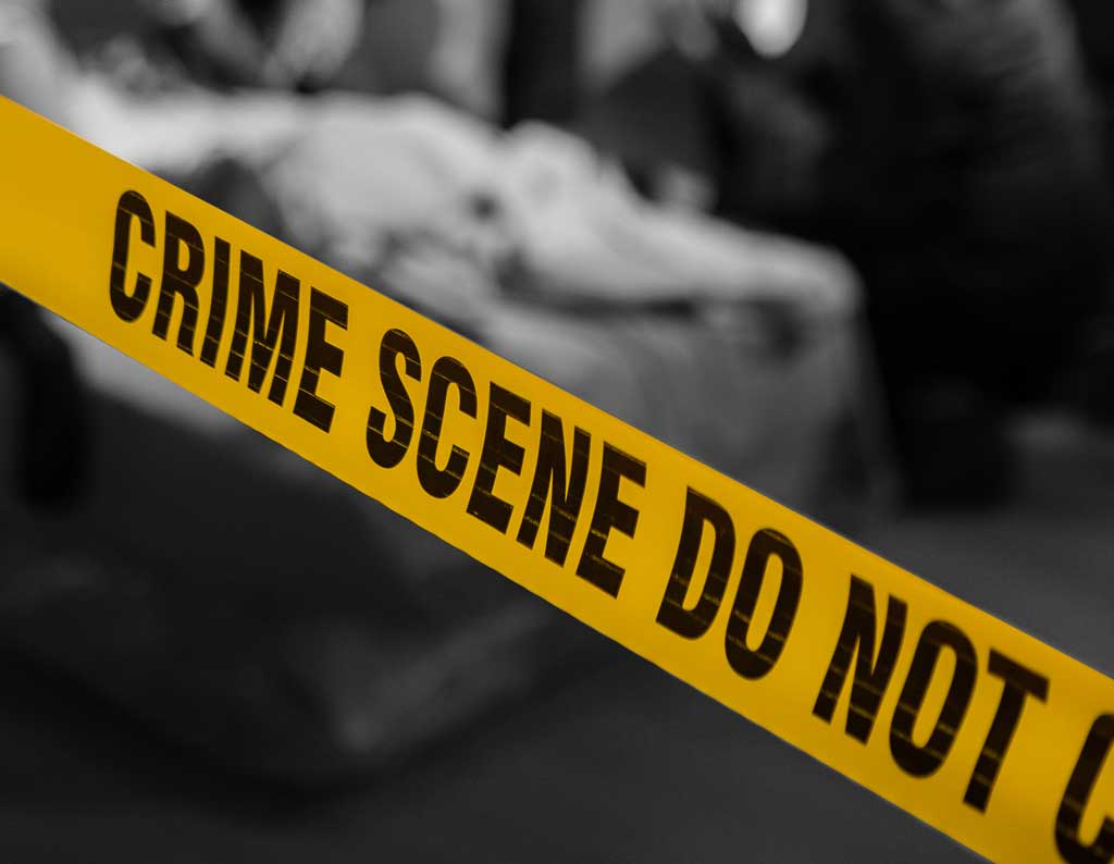 Forensics students at OSU-Tulsa work with actual and re-created crime scenes during their training. Photo by Chris Humphrey Photographer.