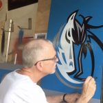 Along with logo design, Whitfield also enjoys painting and lettering.