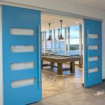 Colorful sliding doors welcome employees into the break room.