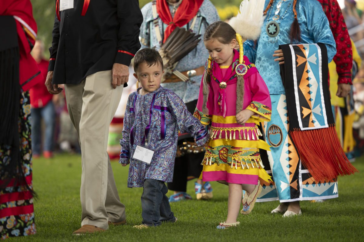 Young members of Citizen Potawatomi Nation walk during the Nation’s Grand Entry event.
Photo courtesy the Citizen Potawatomi Nation