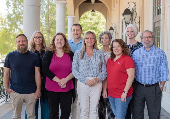 Sarah Gould and KKT Leadership Team including (L-R), Brandon Hackett, Yolanda Wright, Liz Rohrbacker, Francis Wilmore, Sarah Gould, Pam Deatherage, Angela Sexton, Kate Cofer and Jim Boulware.