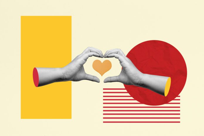 A human hand with a heart gesture showing a heart inside it with a colored background